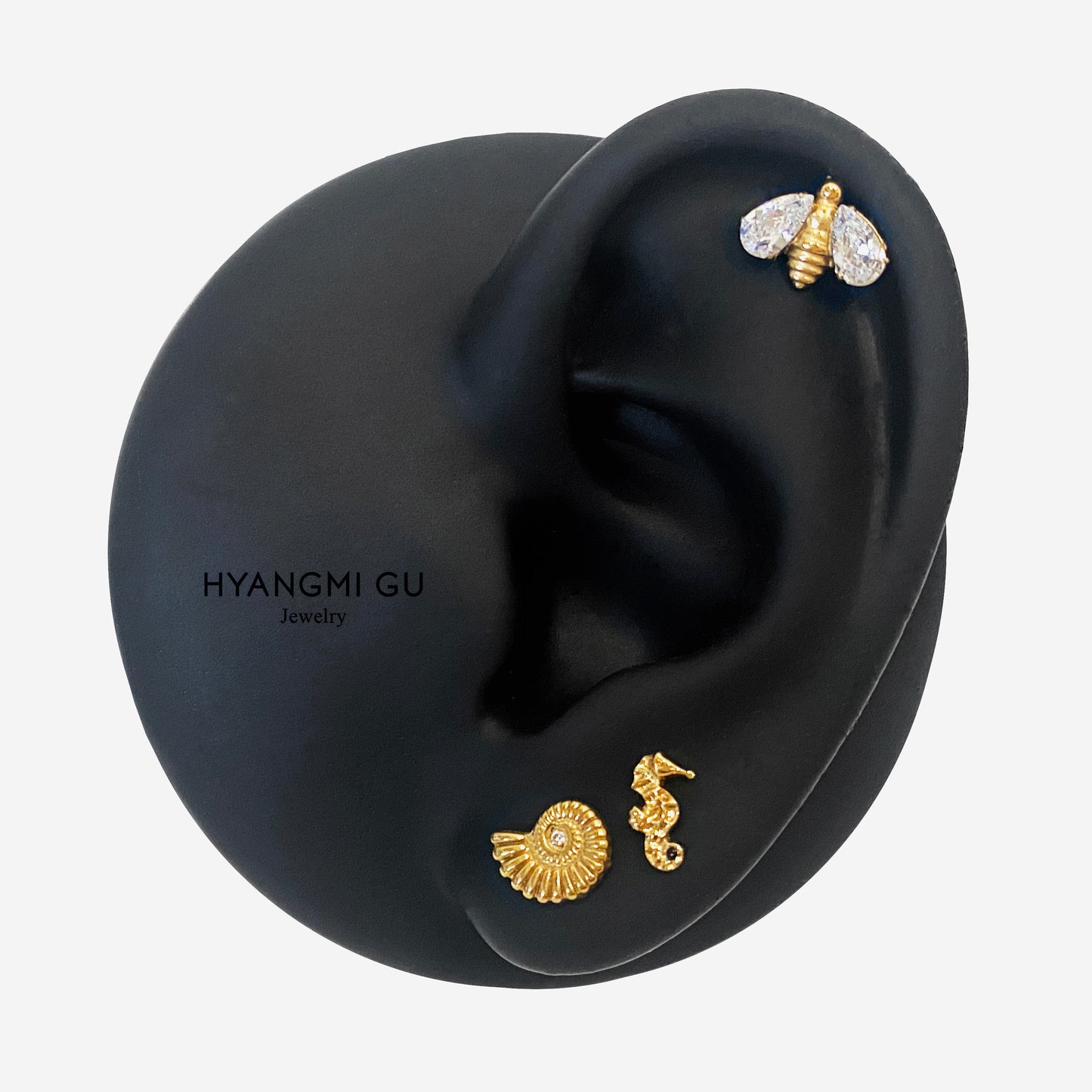 16G Titanium Sea Snail Flat Back Stud