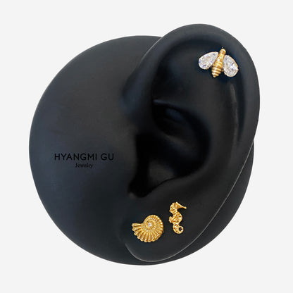 16G Titanium Sea Snail Flat Back Stud