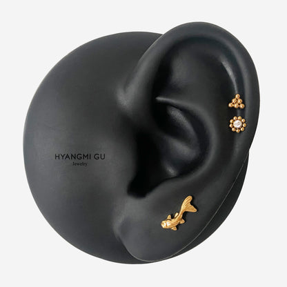 16G Titanium Wave Fish Flat Back Stud